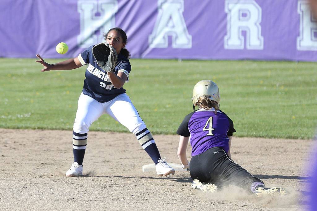 Emily Wilson slides into second base as Arlingtons Tia Langley awaits the throw.(Photo by John Fisken)