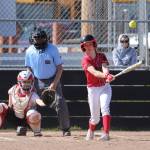 Coupevilles Coral Caveness raps one of her four hits in Wednesdays win over Granite Falls.(Photo by John Fisken)