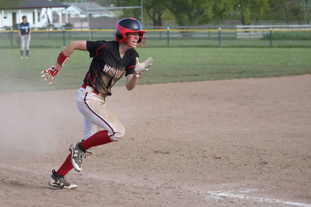 Chelsea Prescott races home for a Coupeville run.(Photo by John Fisken)