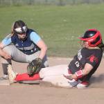 Sarah Wright slides safely into third base.(Photo by John Fisken)