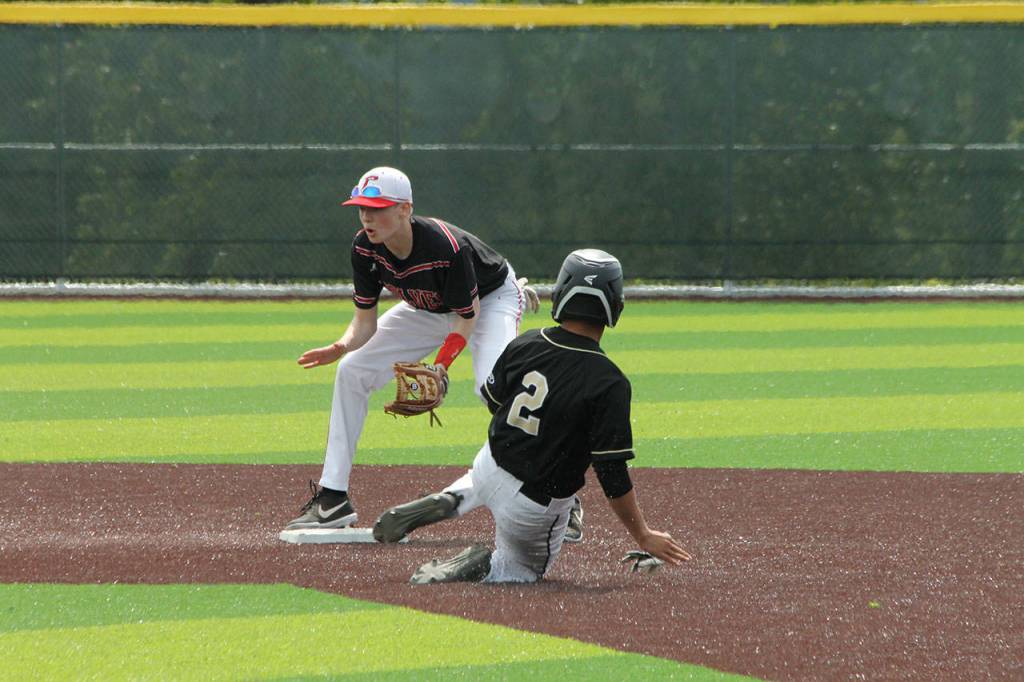 Coupeville second baseman Daniel Olson waits for the ball during a Meridian steal attempt.(Photo by Jim Waller/Whidbey News-Times)