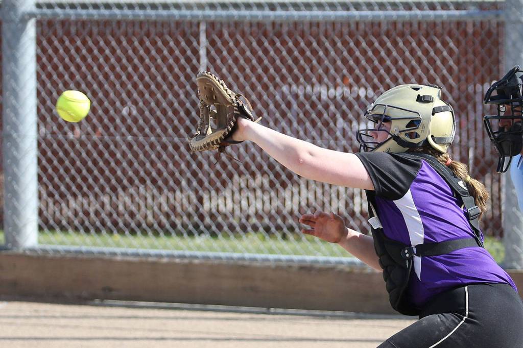 Oak Harbor catcher Maddy Tucker gets ready to receive a pitch.(Photo by John Fisken)
