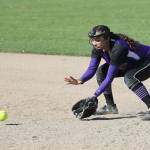 Oak Harbor second baseman Ceirra Dean looks in a ground ball in Mondays game with Meadowdale. (Photo by John Fisken)