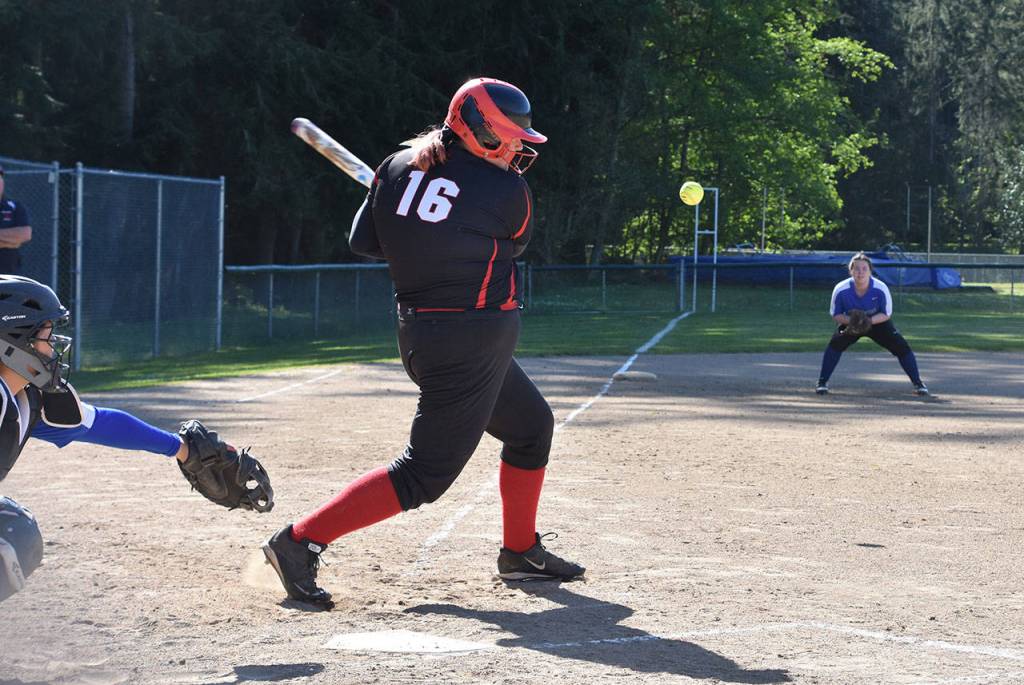 Nicole Laxton puts the ball in play.(Photo by Karen Carlson)