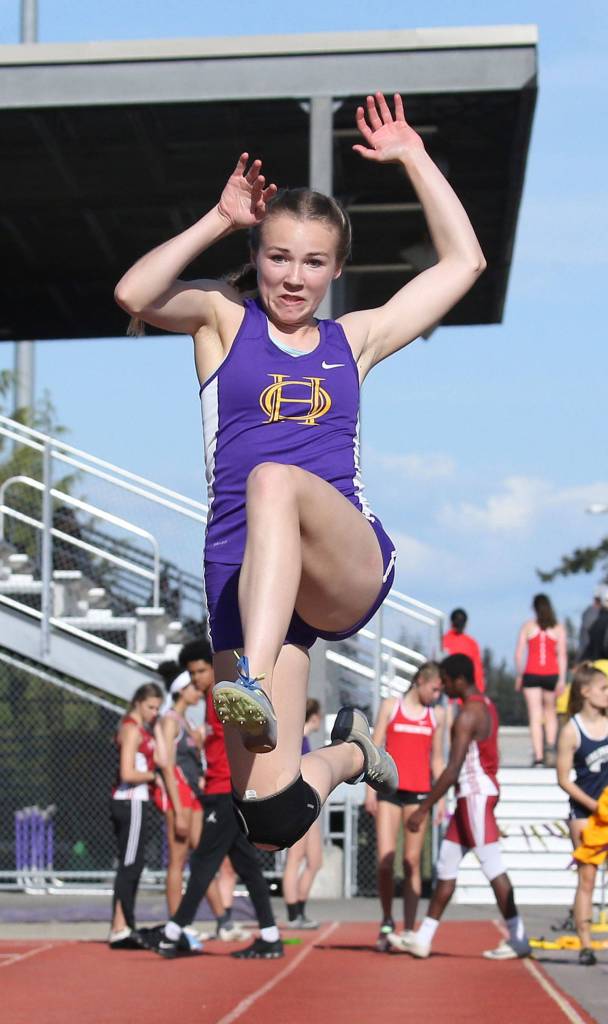 Autumn Coker flies to eighth place in the long jump.(Photo by John Fisken)