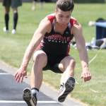 Sean Toomey-Stout lands in the triple jump.(Photo by John Fisken)