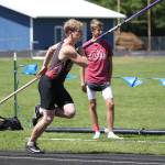 Kyle Burnett heads down the pole vault runway Saturday. (Photo by John Fisken)