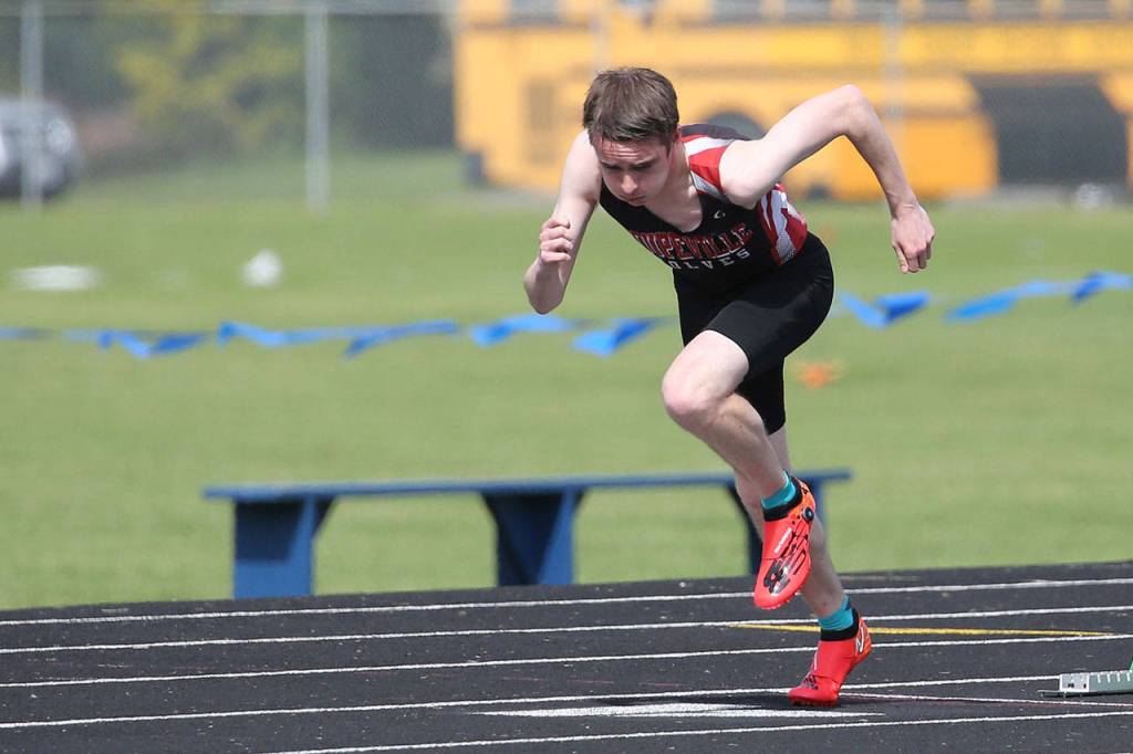 Danny Conlisk takes off on the way to winning the 200.(Photo by John Fisken)