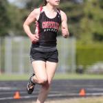 Alana Mihill competes in the 3,200 for the Wolves.(Photo by John Fisken)