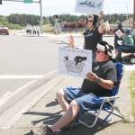 Photo by Laura Guido/Whidbey News-Times)                                Gary and Tammy Shelton traveled to Coupeville from Port Ludlow to participate in the annual Empty the Tanks protest to advocate for the release of orcas. Though it is a worldwide event, the local gathering focused on Lolita  the last remaining survivor of the infamous 1970 Penn Cove orca capture.