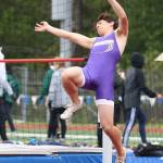 Juan Luna-Elliott leaps to fourth place and a state berth in the high jump.(Photo by John Fisken)