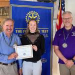 Rotary President-elect Steve Schwalbe presents the Student of the Month to Danielle Lonborg. Oak Harbor High School Principal Dwight Lundstrom stands on the right. Photo provided