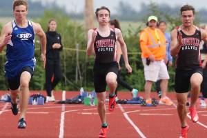 The long and short of it: Conlisk develops into one of state’s top sprinters / Track