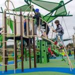 U.S. Navy photo                                Sailors and their families familiarize themselves with the reconstructed playground area at Costen-Turner Memorial Park located on Ault Field at Naval Air Station Whidbey Island.