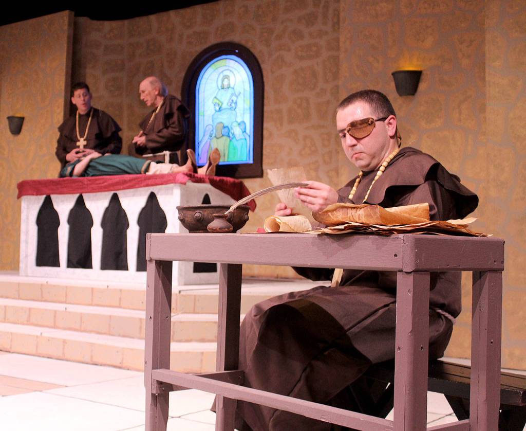 Whidbey Playhouse presents Incorruptible, a story based on a reported theft of the bones of a saint in 1250 A.D. Hilarious antics ensue when monks try to find a replacement. Chris Kehoe, right, leads the cast as he turns from a suspected thief into a reluctant temporary monk.