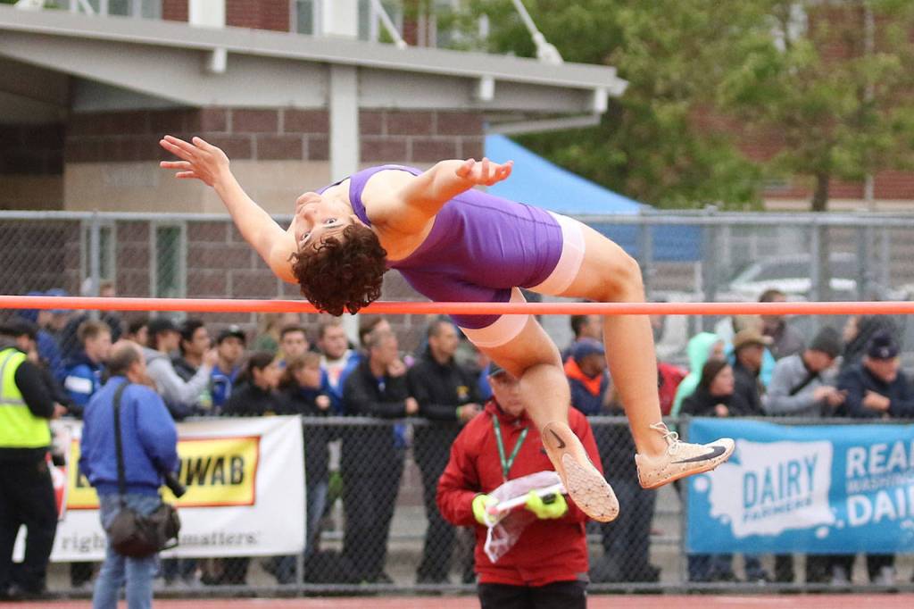 Oak Harbors Juan Luna-Elliott clears 5-08 in the high jump. (Photo by John Fisken)