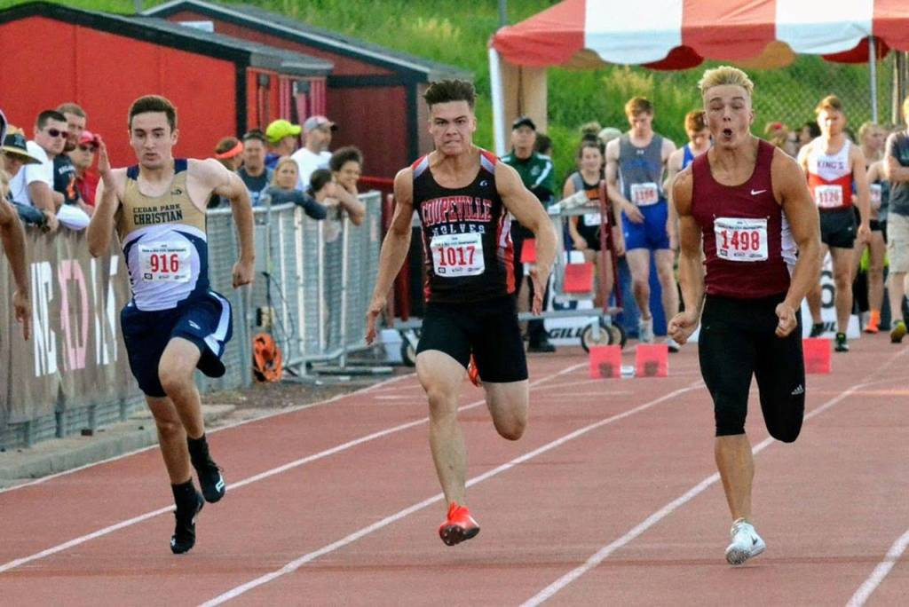 Coupevilles Sean Toomey-Stout, center, competes in the heats of the 100 meters.(Photo by Karen Swegler)