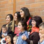 Bruna Moratori and her family smile for photos after the ceremony. Photo by Maria Matson/Whidbey News-Times