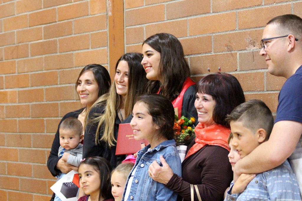 Bruna Moratori and her family smile for photos after the ceremony. Photo by Maria Matson/Whidbey News-Times