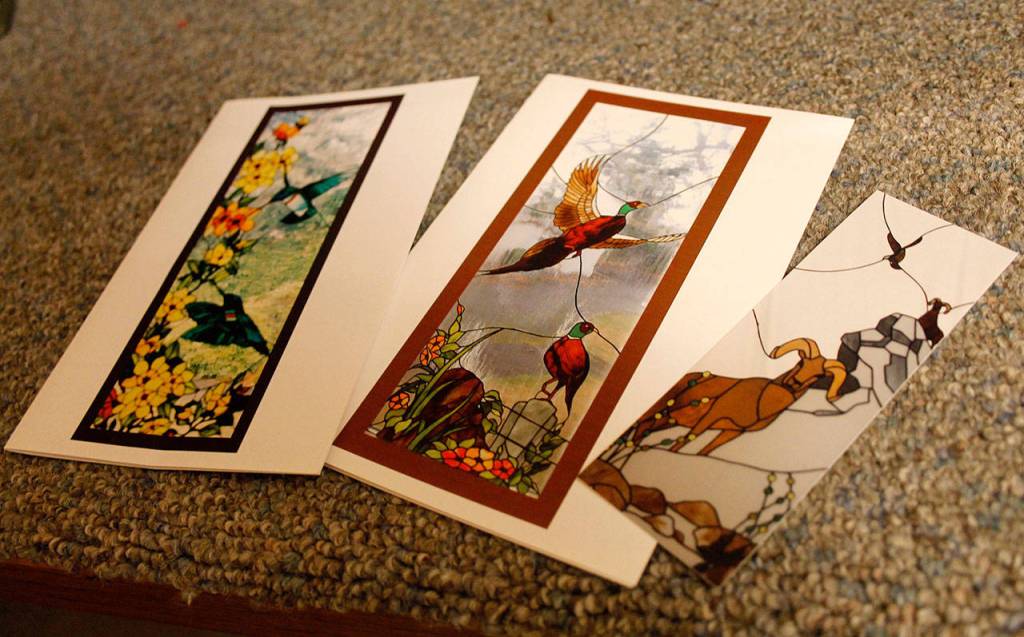 DeShongs artistic work included stained glass windows, three of which are pictured here. She also worked with other mediums, including oils and watercolors.