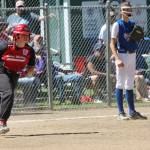 McMillan steams toward second base during her triple.(Photo by Jim Waller/Whidbey News-Times)