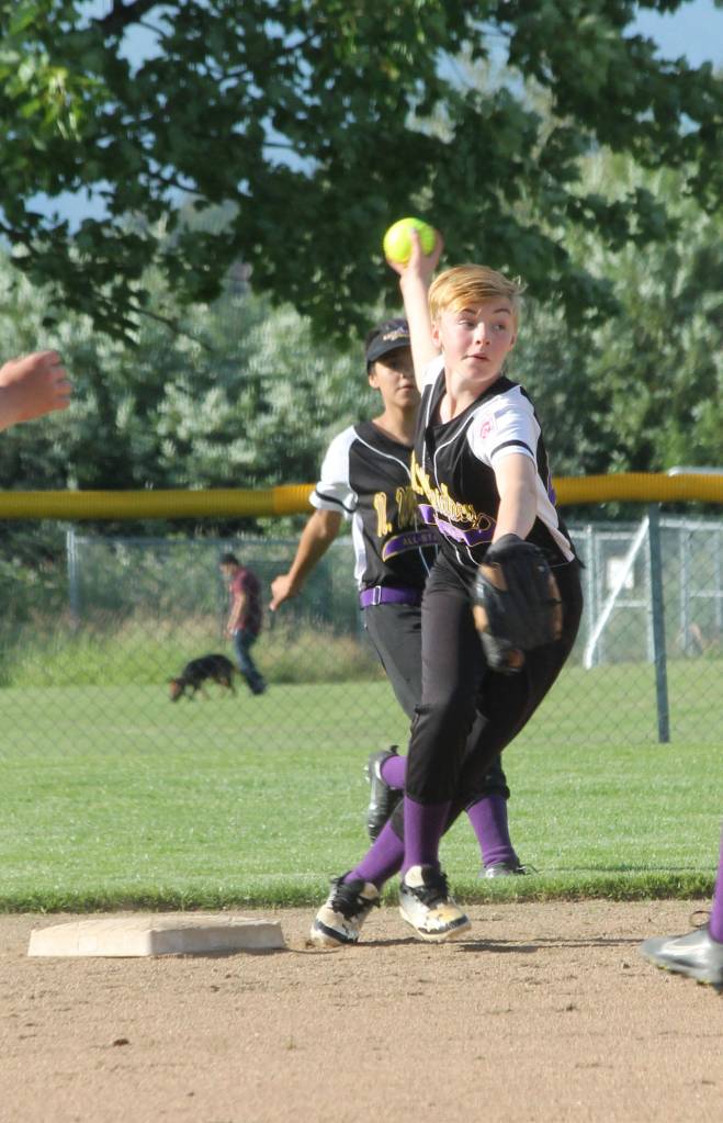 Second baseman Destiny Neal throws to first base.(Photo by Jim Waller/Whidbey News-Times)