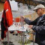 (Photo by Maria Matson/Whidbey News-Times)                                Coupeville Lions Club vice president Rick Walti explains the new features of this years sale.