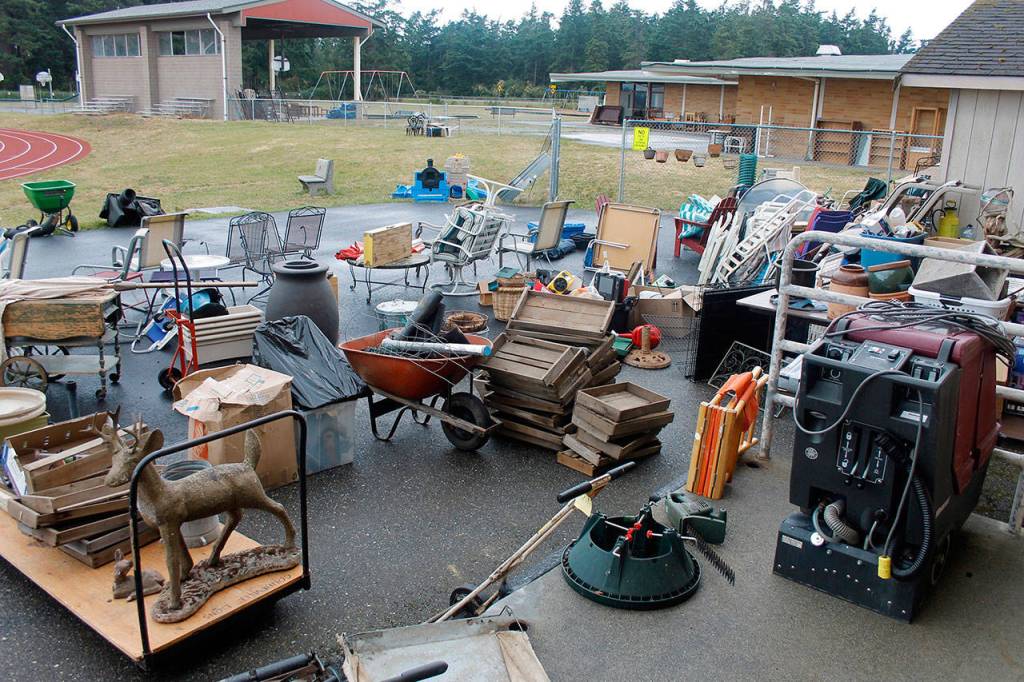 (Photo by Maria Matson/Whidbey News-Times)                                Items for the sale fill both the inside and outside of school buildings.