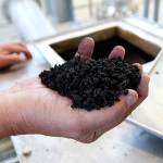 Operators working to de-stink dryer at sewage treatment plant