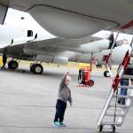 Photo by Laura Guido/Whidbey News-Times                                Daniel Spade, 2, peers up at a P-3C Orion during this years open house Saturday at Ault Field. The event offers a rare opportunity to get an up close look at the aircraft and other equipment used at Naval Air Station Whidbey Island.