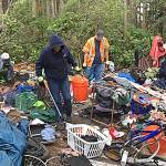 Work crews clean up trashed sites