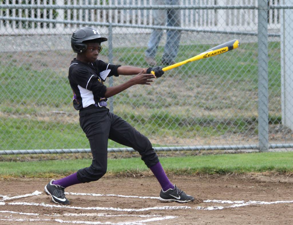 Maurice Walker takes a cut in Tuesdays game.(Photo by Jim Waller/Whidbey News-Times)