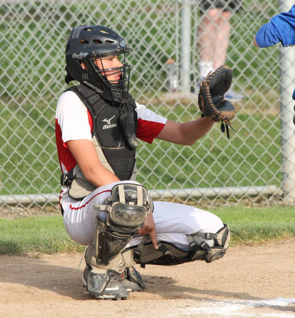 Catcher Johnny Porter calls a pitch in Fridays game.(Photo by Jim Waller/Whidbey News-Times)