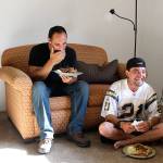 Michael Steen, left, and Ryan Berry crack up during a house meeting Monday at Jakes House, a sober home run by a local nonprofit. Photo by Laura Guido/Whidbey News-Times