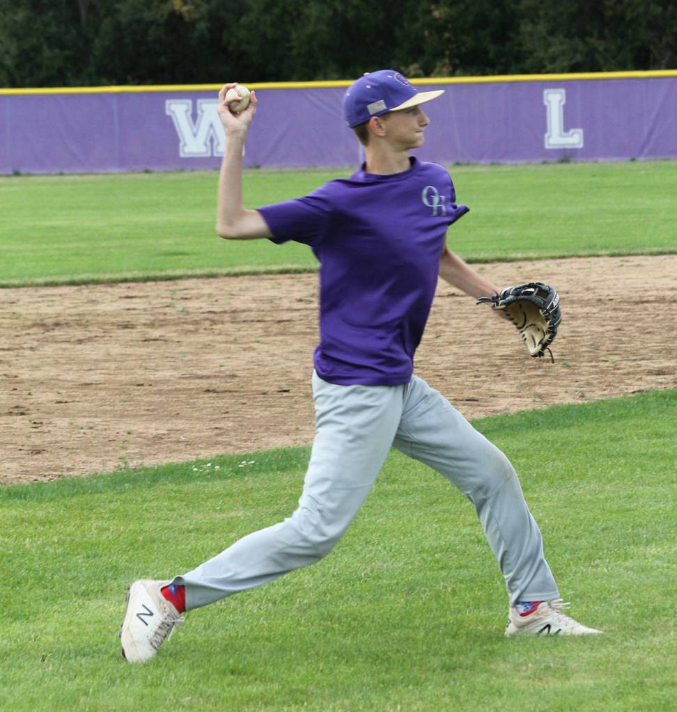 Third baseman Brock Boyer tosses across the diamond.(Photo by Jim Waller/Whidbey News-Times)