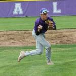 Shortstop Gage McLeod gathers his feet and prepares to throw after fielding a slow roller.(Photo by Jim Waller/Whidbey News-Times)