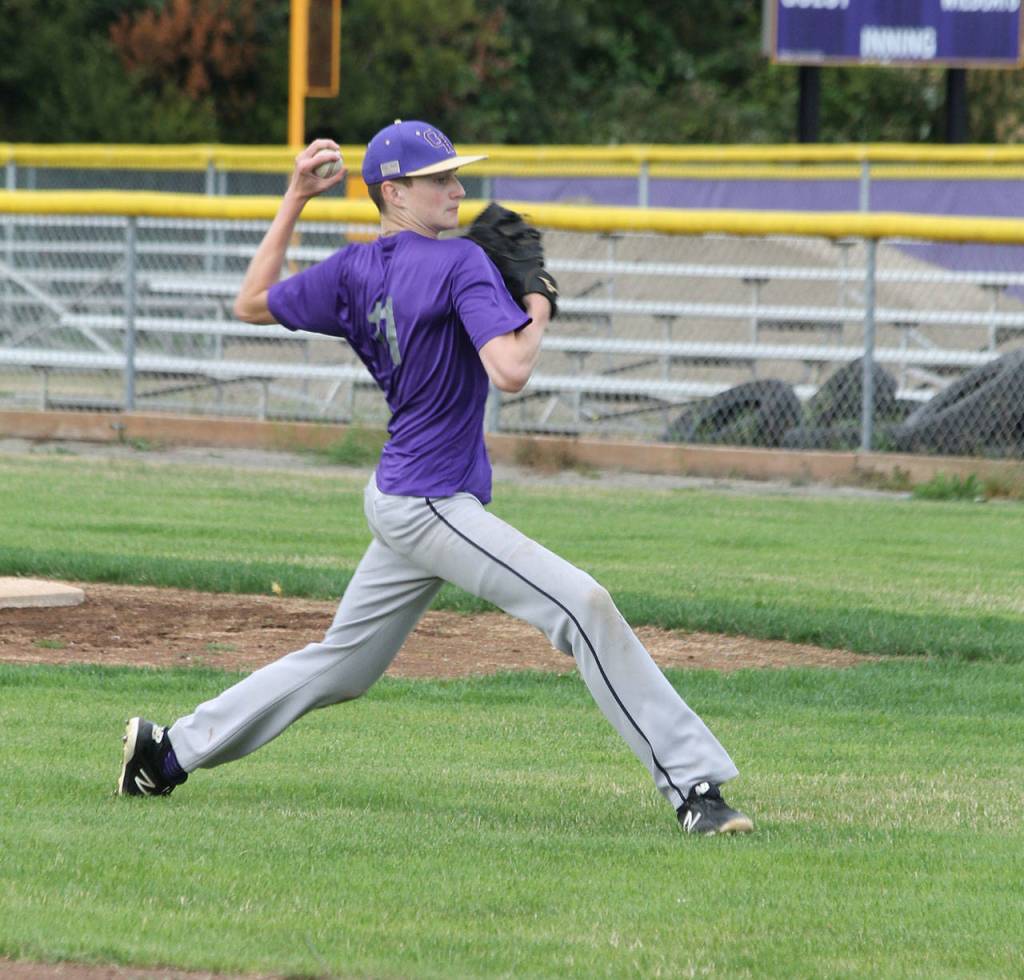 First baseman Will Rankin relays a throw to the plate.(Photo by Jim Waller/Whidbey News-Times)