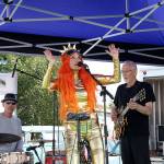 Piper Reva, lead singer of Piper and the Planets, performs with bandmember Steve Trembley, on guitar, and Mike Smith, drums at the Coupeville Arts and Crafts Festival Saturday.