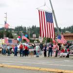 Navy supporters wave their signs to passing cars on Highway 20 in Oak Harbor Saturday afternoon. (Photos by Laura Guido/Whidbey News-Times)