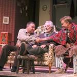 Photo by Laura Guido/Whidbey News-Times                                Far left, Stanley Jerome, played by Chris Kehoe, shakes hands with his brother Eugene, played by Ethan Webb. Their socialist grandfather Ben, played by Ben Honeycutt sits between them.