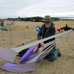 Dick Barnes, known as a master kite maker, works on a ground display at Fort Casey on Saturday Sept. 7.