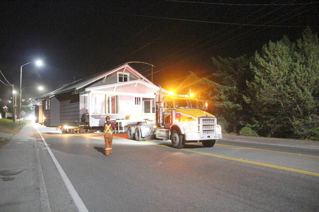 Photo by Jessie Stensland / Whidbey News Times                                Houses from the former Freund farm were moved to a new site outside of the city this week.