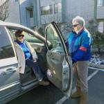 Client Jackie Milligan, left, and driver Millie Leengran, right, participate in the Medical Transportation program at Island Senior Resources. Photo courtesy of Island Senior Services