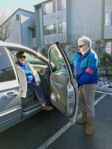 Client Jackie Milligan, left, and driver Millie Leengran, right, participate in the Medical Transportation program at Island Senior Resources. Photo courtesy of Island Senior Services