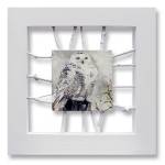 Artist Doug Hansen captures the beauty of a Snowy Owl. Photo provided by Whidbey Art Gallery