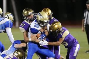 Oak Harbor begins new era with win / Football