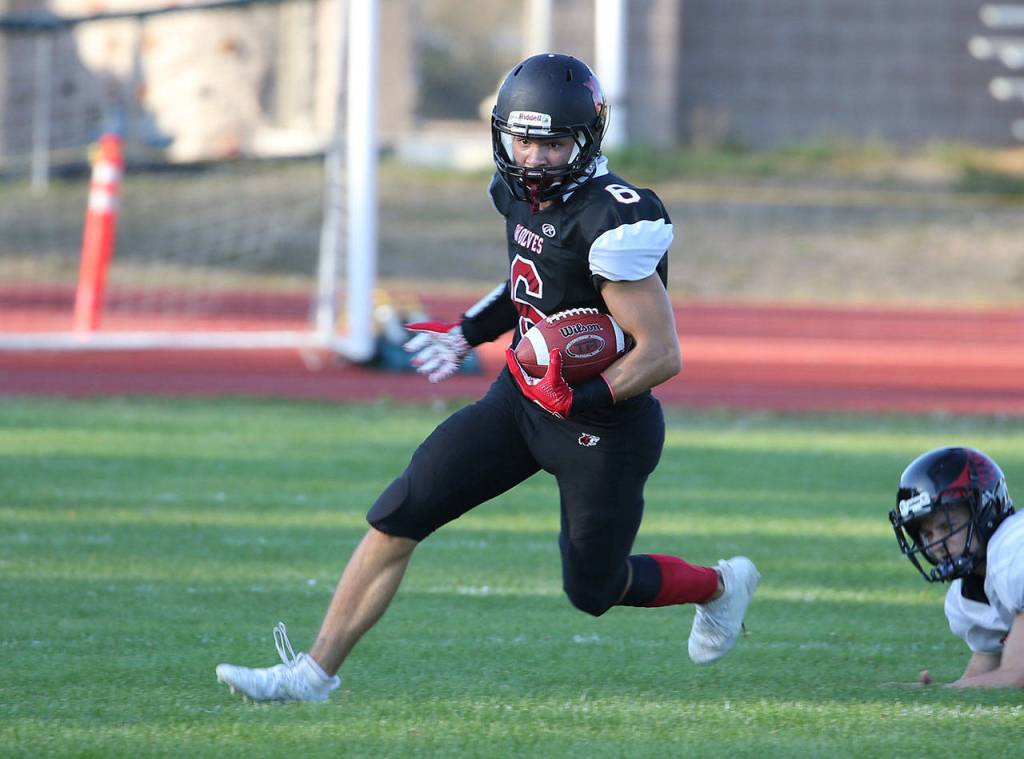 Sean Toomey-Stout cuts upfield for the Wolves.(Photo by John Fisken)