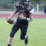 Quarterback Dawson Houston looks for an open receiver.(Photo by John Fisken)