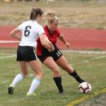 Avalon Renninger, right, works the ball toward the goal.(Photo by John Fisken)