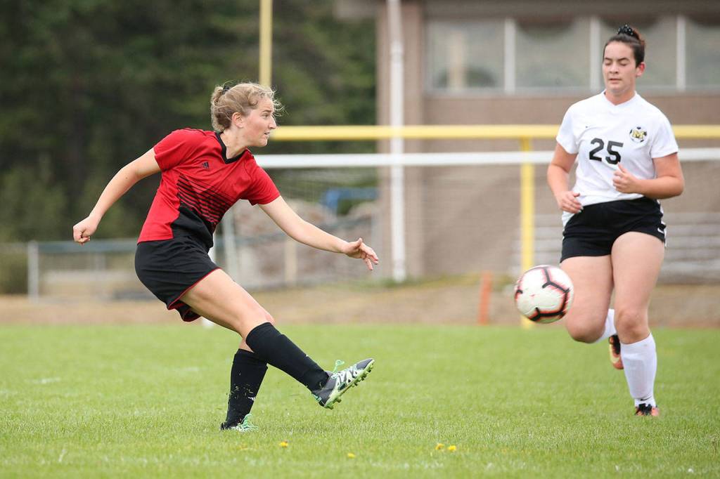 Tia Wurzrainer passes the ball for Coupeville.(Photo by John Fisken)